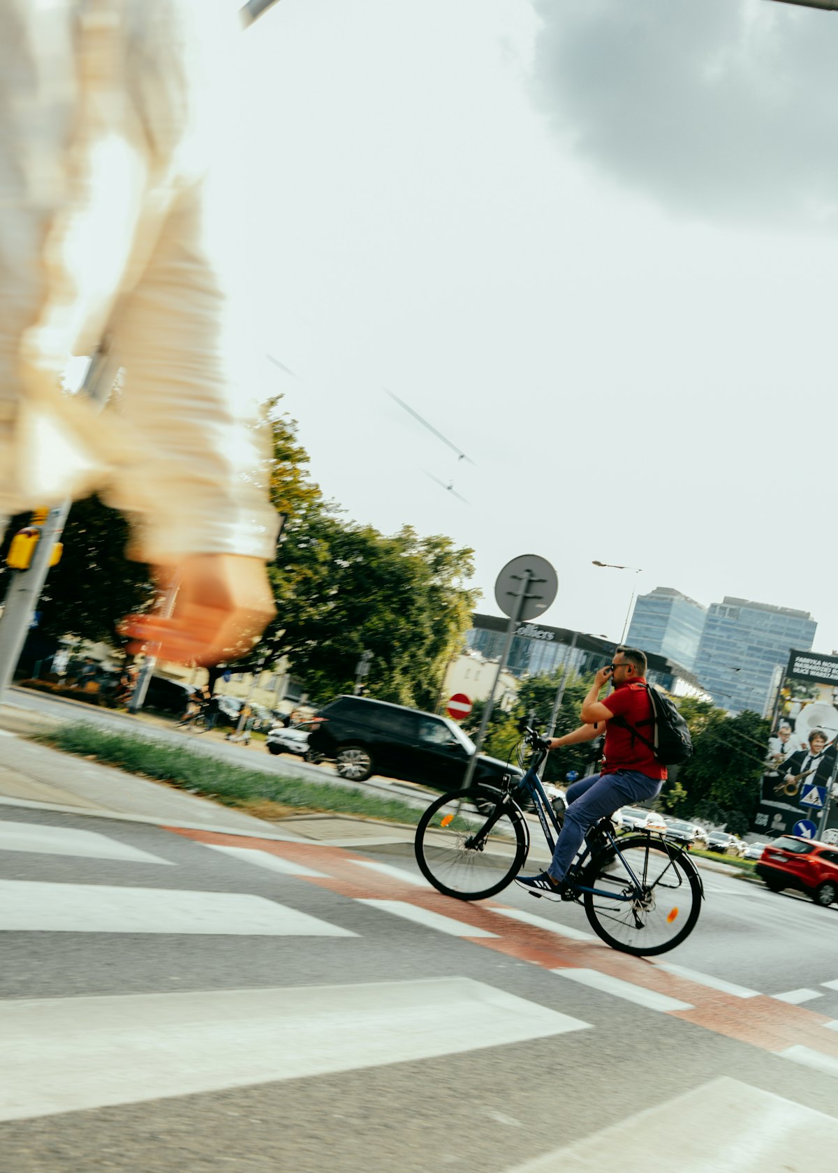 Cyclist crossing a busy city street