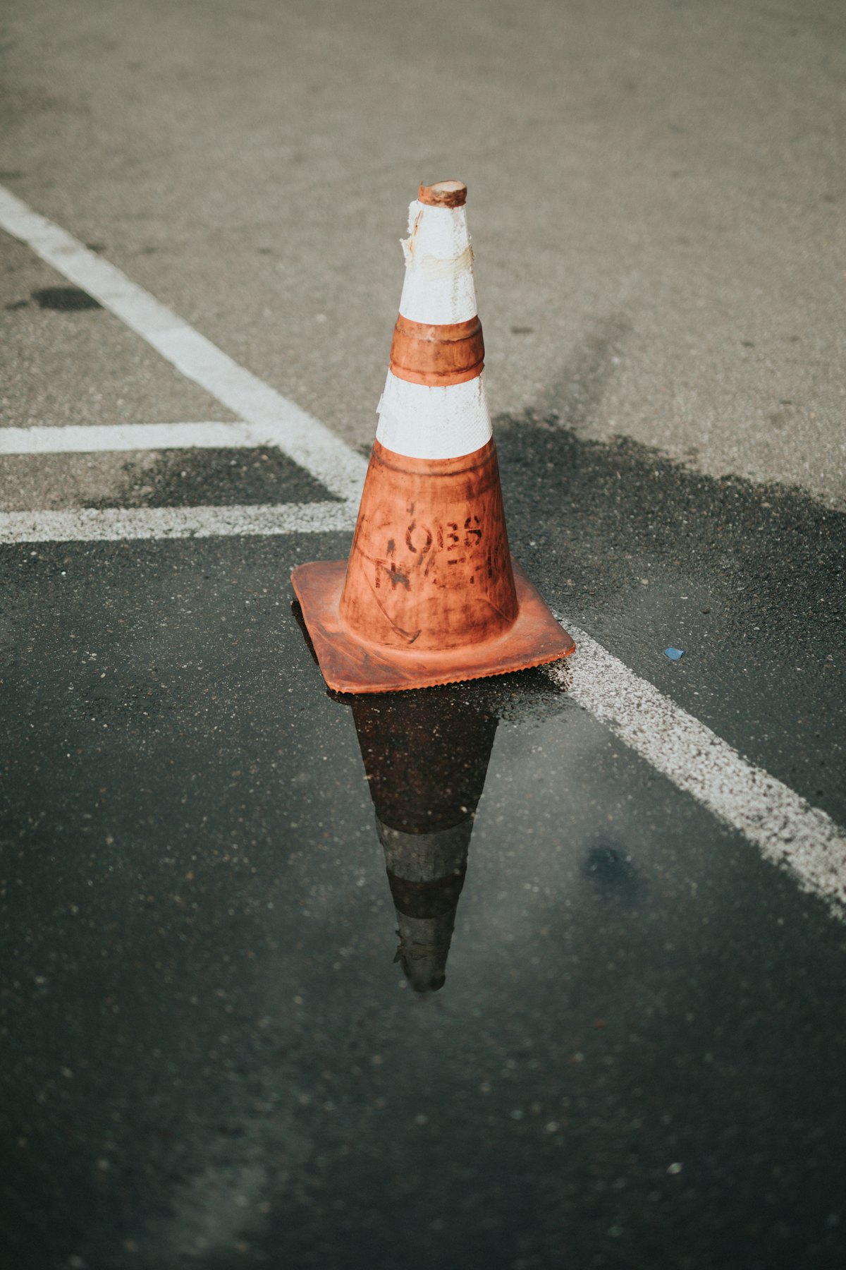 Traffic cone on an asphalt road